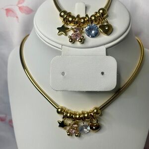 Elegant Gold Necklace with Pink and Blue Charms